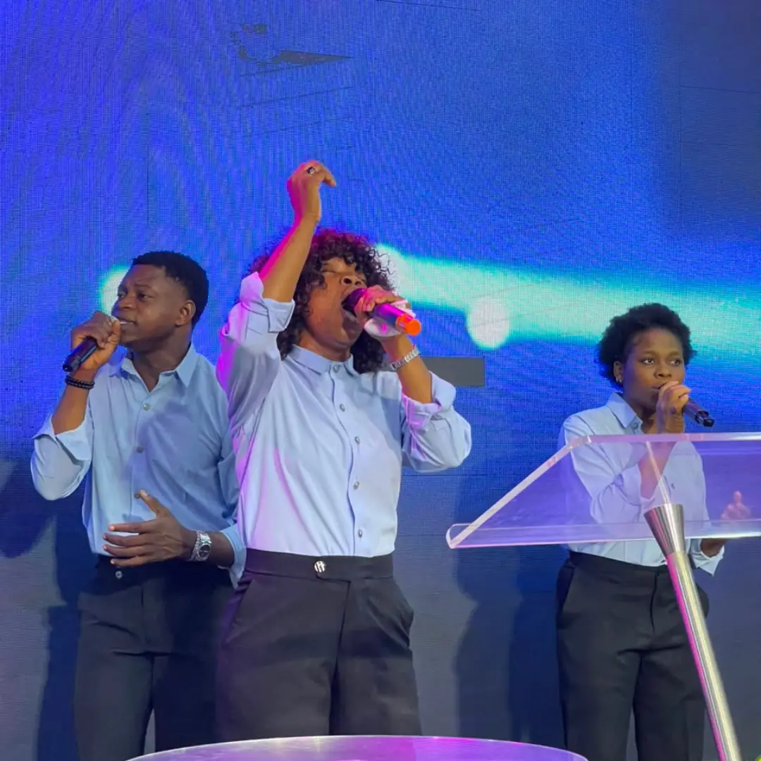 Worship leaders singing together during an EDSA gathering.